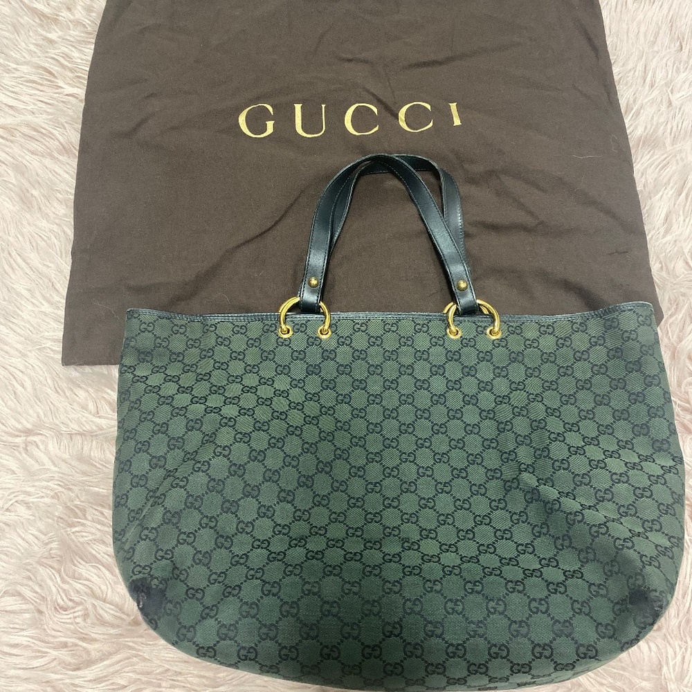 Large oversized Gucci bag with gold hardware